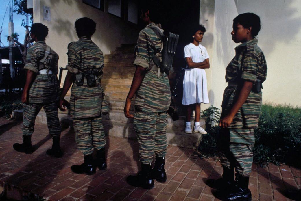 Female LTTE fighters with schoolgirl, Jaffna, 1989